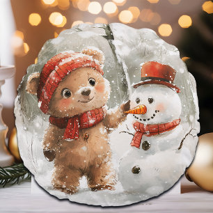 Teddybeer en sneeuwpop rond kussen