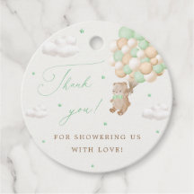 Teddybeer met groene ballonnen