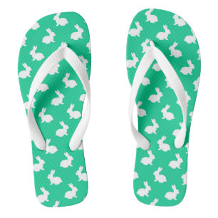 Teenslippers van groene en witte konijnen