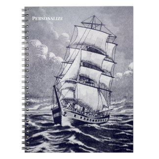 Tekening van oud zeilschip in marineblauw en kustz notitieboek