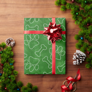 Tekeningpatroon van hondenpoot en botten in groene cadeaupapier