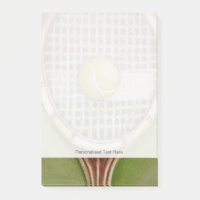 Tennis Racket met Ball Laying over Court