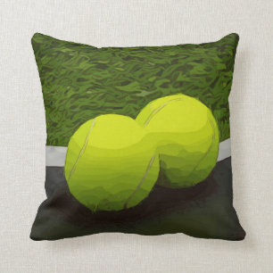 Tennisbal op groen gras kussen