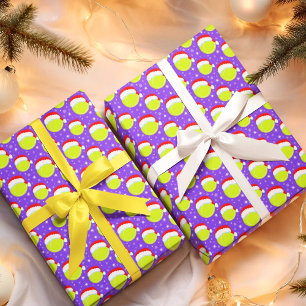 Tennisballen dragen Santa's hoed en sneeuwvlokken Cadeaupapier