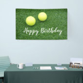 Tennisballen op groen gras spandoek (Beurs)