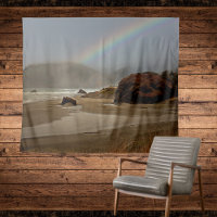Arc-en-ciel et nuages sur la plage de l'Oregon dan
