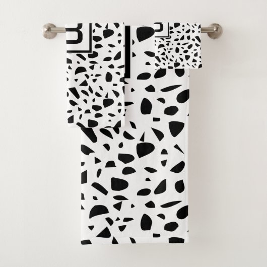 Terrazzo blanc noir motif monogramme initial (En situation)