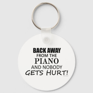 Terug van de piano sleutelhanger