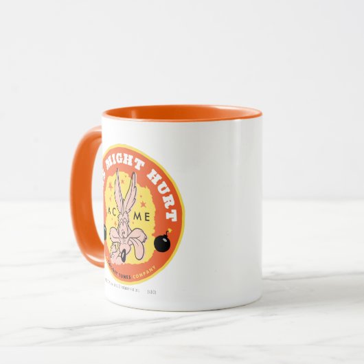 TERWIJL E. COYOTE™ Acme - Dit kan pijn doen Mok (Voorkant links)