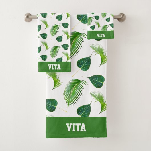 Texte et feuilles vertes sur serviette de bain bla (En situation)