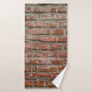 Textuur. Brick. Wall. A background with attritions Badhanddoek
