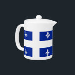 Thé Drapeau du Québec<br><div class="desc">Faites-vous plaisir avec notre théière exclusive avec le drapeau du Québec! Conçu avec une attention minutieuse aux détails, cette théière est plus qu’une simple cuisine essentielle, c’est une célébration de la riche culture et du patrimoine québécois. Le design saisissant affiche le drapeau emblématique du Québec, faisant de cette théière une...</div>