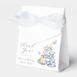 Thee met mama om baby shower te zijn bedankdoosjes