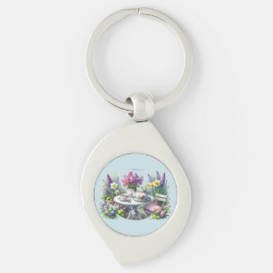 Theekrans met vintage bloemmotieven in de tuin sleutelhanger