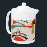 Théière atomique moderne de tissu de la moitié du<br><div class="desc">Chaque jour peut être un souffle du passé avec cette théière inspirée moderne de la moitié du siècle. Les caractéristiques de conception une reproduction d'un motif mobile atomique vintage de tissu. L'arrière - plan est ecru avec des formes bleues, oranges, vertes et noires d'art moderne. C'est la théière légère idéale...</div>