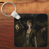 Thin female carrying lamp sleutelhanger (Voorkant)