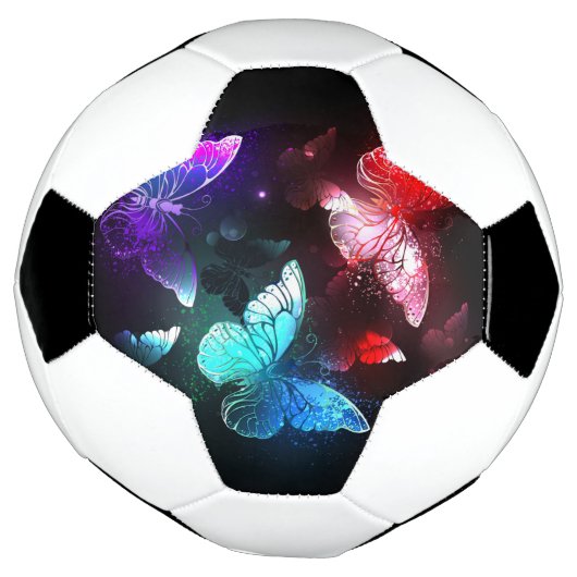 Three Glowing Butterflies on night background (Tourné)