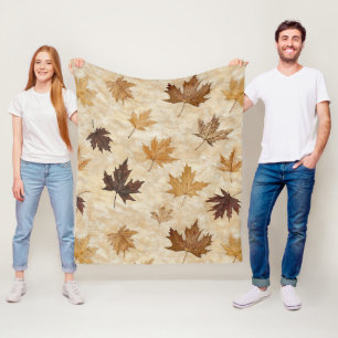Tijdloze botanische harmonie – blad in warme neutr fleece deken