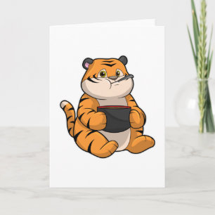 Tijger tijdens het eten met kom kaart