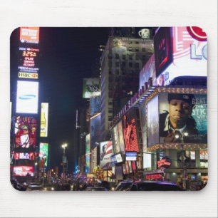 Times Square in de nacht in Manhattan, New York Muismat