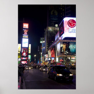 Times Square in de nacht in Manhattan, New York Poster