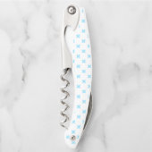 Tire-bouchon Bébé bleu croix coutures sur blanc (Devant)