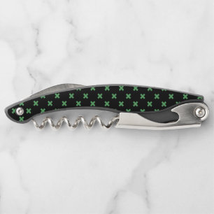 Tire-bouchon Croix verte coutures sur noir