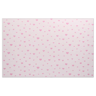 Tissu Coeurs roses éparpillés sur rose pâle