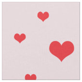 Tissu Coeurs rouges éparpillés sur couleur rose pâle (Fermer)