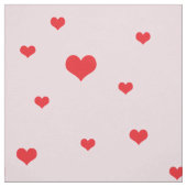 Tissu Coeurs rouges éparpillés sur couleur rose pâle (Échantillon)
