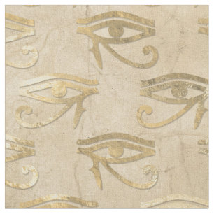Tissu L'oeil égyptien en or métallique sur l'ivoire