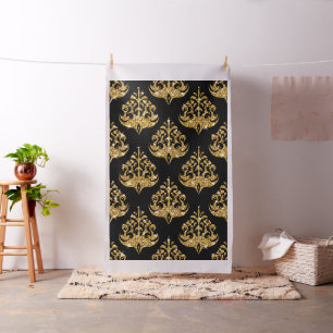 Tissu Motif damassé noir et or