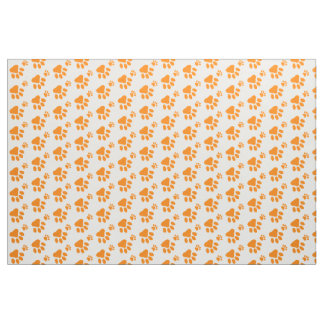 Tissu motif orange d'empreinte de patte de chien