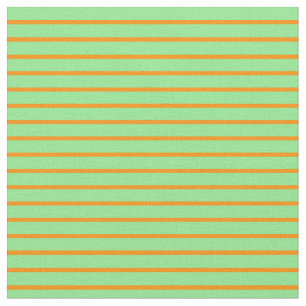 Tissu Orange foncée et Motif vert clair