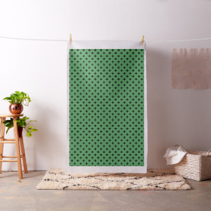 Tissu Polka noire croise sur vert