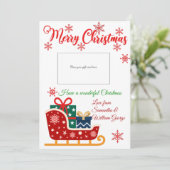 Titulaire de la carte cadeau de vacances Père Noël (Debout devant)