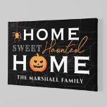 Toile Accueil Sweet Haunted Maison Personnalisée Hallowe<br><div class="desc">Bienvenue à vos invités avec ce éffrayant plaisir personnalisé de toile d'Halloween. La conception de typographie élégante comprend le libellé "Home Sweet Haunted Home" avec texte personnalisé pour votre nom de famille et les accents d'un citrouille jack-o-lanterne effrayant, araignée déplaisante pendante, et araignée arrière - plan web. Comprend un jeu...</div>