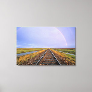 Toile Arc-en-ciel au-dessus des voies ferrées près de Fa