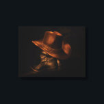 Toile Botte en Casquette et en cuir de Cowboy Masculine<br><div class="desc">Une paire de bottes de cowboy en cuir noir est posée sur le sol avec un casquette de cowboy marron drapé sur le dessus.</div>