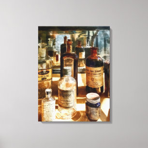 Toile Bouteilles de médecine dans le cas en verre