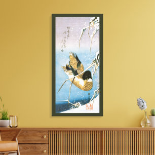 Toile Canard sauvage nageant sous des roseaux enneigés p