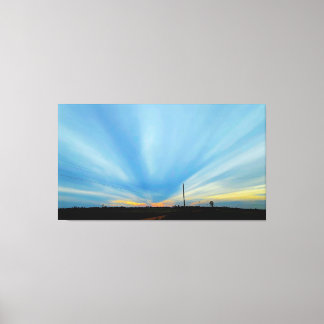 Toile Coucher de soleil dramatique sur un paysage rural