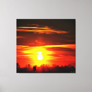 Toile Coucher de soleil enflammé sur les arbres
