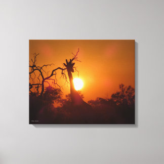 Toile Coucher de soleil rouge et or avec une girafe en s