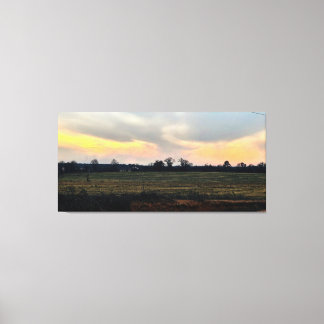 Toile Coucher de soleil sur un champ à la campagne