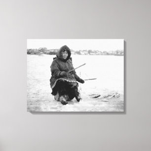 Toile Eskimo Ice Fishing in Nome, Alaska Photographie
