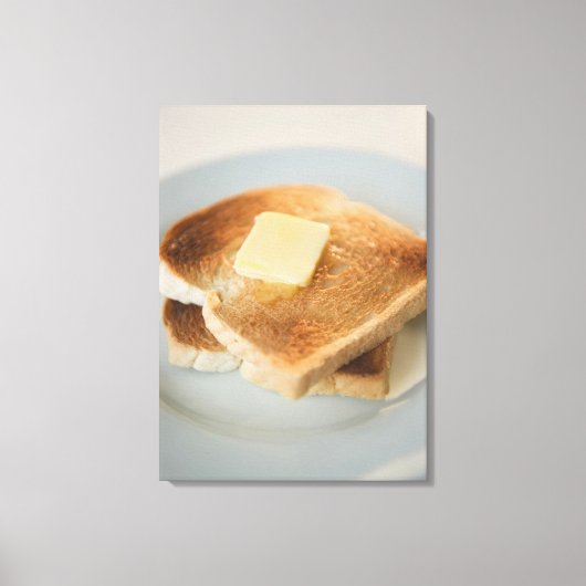 Toile Fermer les toasts avec du beurre dans l'assiette (Recto)