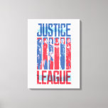 Toile Ligue de Justice | Blue & Red Group Pop Art<br><div class="desc">Ce graphique patriotique de la Ligue de la Justice est peint en bleu et en rouge,  les membres de la Ligue ont posé en alternance des bandes de couleurs entre le logo du film de la Ligue de la Justice.</div>