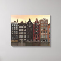 Maisons du canal d'Amsterdam au coucher du soleil