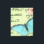 Toile Papillon à ailes bleues sur carte postale Turquois<br><div class="desc">Cette carte postale turquoise porte un message de beauté. Un délicat papillon à ailes bleues repose sur la carte, obscurcissant une partie du script qu'il contient. Cette impression de Vision Studio ferait un grand ajout à votre maison!</div>